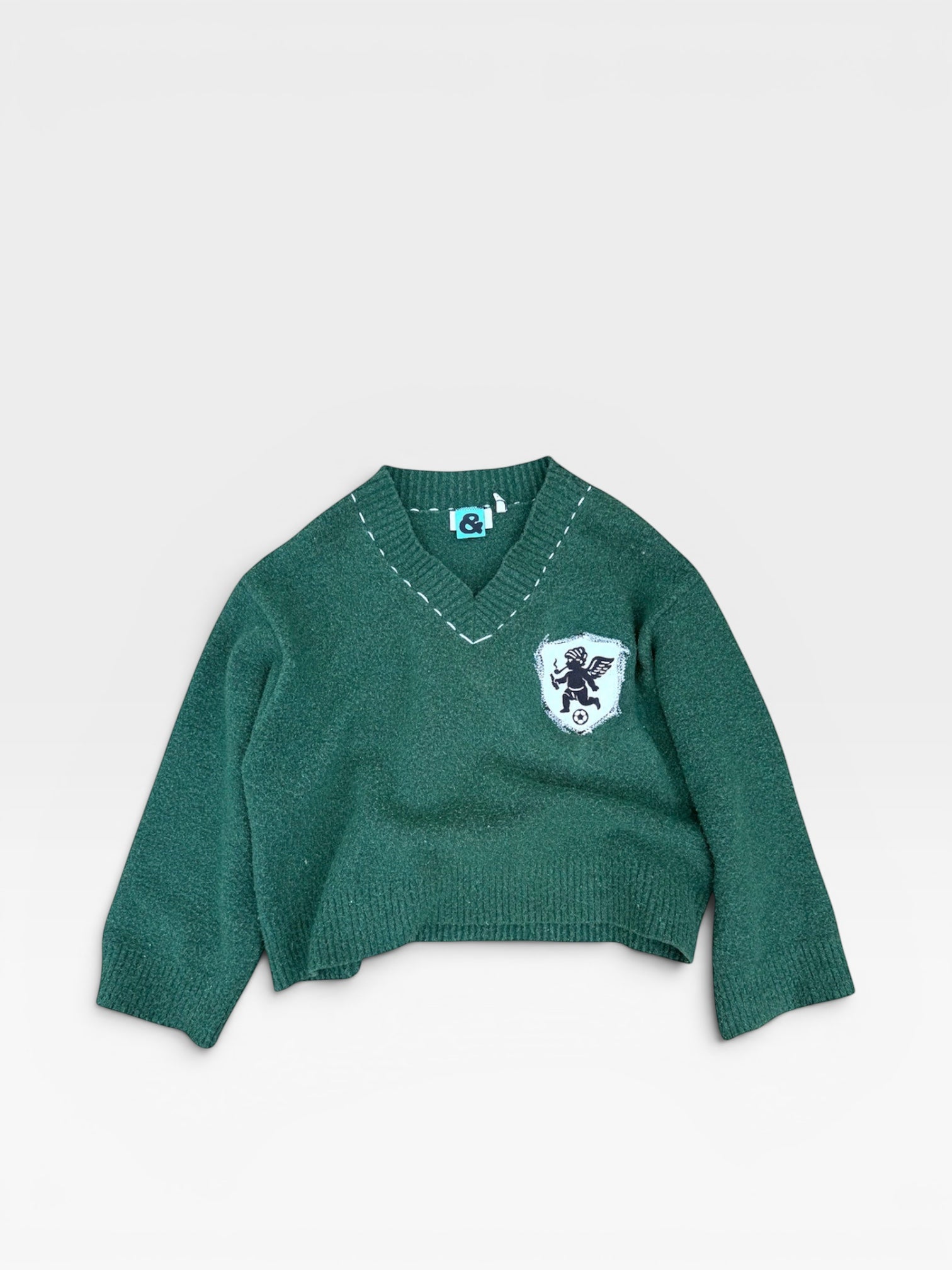 andvamos Cricket Jumper — reworked green cricket jumper with cherub patch, front view