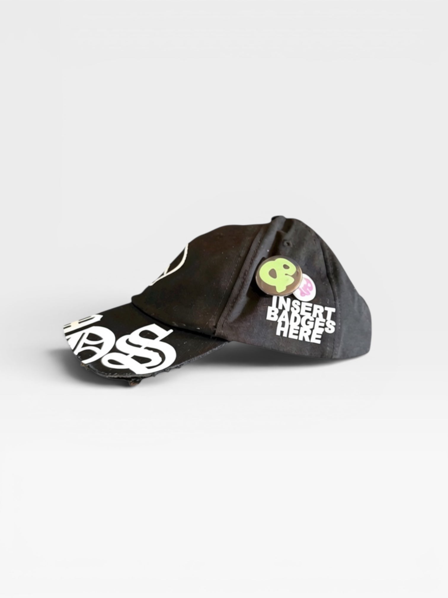 andvamos Motor Cap — one-of-a-kind distressed black cap with white graphic text and custom badges, front view